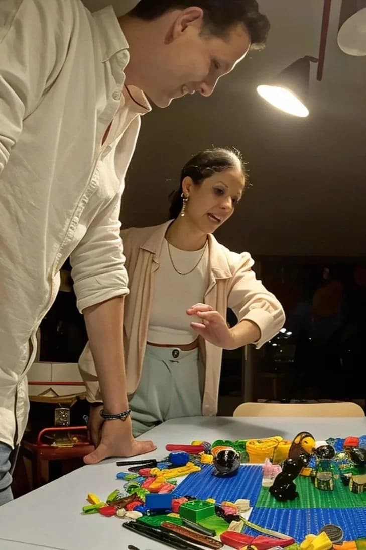 Rafaela Buena leading a LEGO® Serious Play® exercise with a participant